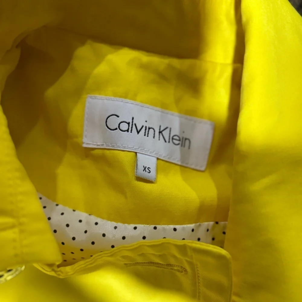 Women’s Michael Kors yellow coat. Size xs